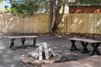 This brilliantly restored home delivers comfort, charm, and on Charlevoix Golf Club in Michigan - for sale on GolfHomes.com, golf home, golf lot