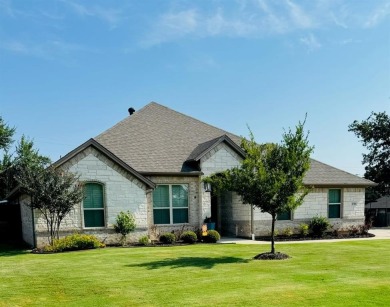 This beautifully designed home offers a blend of modern on Pecan Plantation Country Club in Texas - for sale on GolfHomes.com, golf home, golf lot