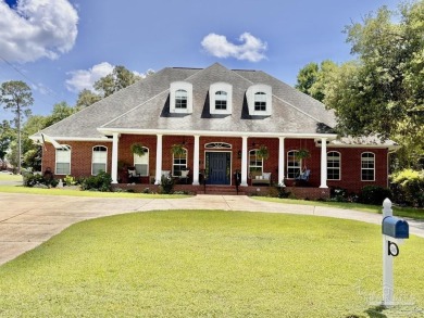 This stunning custom built 2 story brick home on 9th fairway in on Scenic Hills Country Club in Florida - for sale on GolfHomes.com, golf home, golf lot