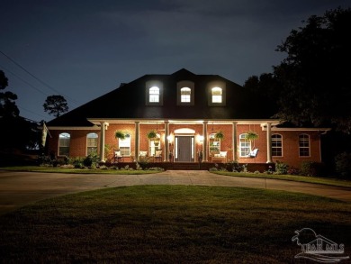 This stunning custom built 2 story brick home on 9th fairway in on Scenic Hills Country Club in Florida - for sale on GolfHomes.com, golf home, golf lot