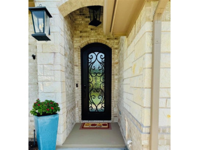 This beautifully designed home offers a blend of modern on Pecan Plantation Country Club in Texas - for sale on GolfHomes.com, golf home, golf lot