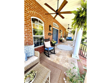 This stunning custom built 2 story brick home on 9th fairway in on Scenic Hills Country Club in Florida - for sale on GolfHomes.com, golf home, golf lot