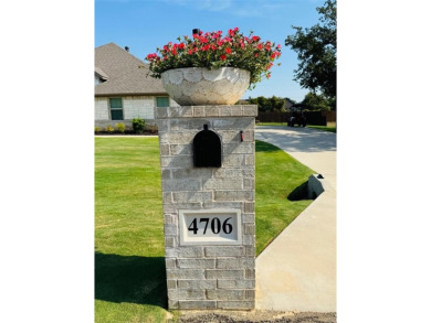 This beautifully designed home offers a blend of modern on Pecan Plantation Country Club in Texas - for sale on GolfHomes.com, golf home, golf lot