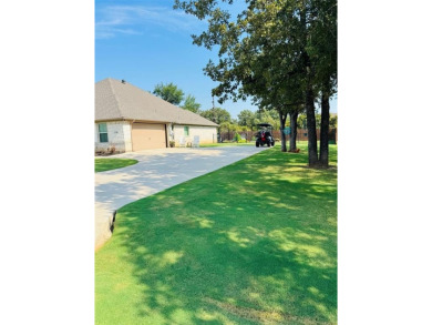 This beautifully designed home offers a blend of modern on Pecan Plantation Country Club in Texas - for sale on GolfHomes.com, golf home, golf lot