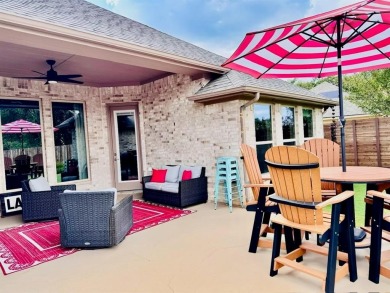 This beautifully designed home offers a blend of modern on Pecan Plantation Country Club in Texas - for sale on GolfHomes.com, golf home, golf lot