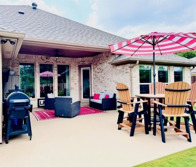 This beautifully designed home offers a blend of modern on Pecan Plantation Country Club in Texas - for sale on GolfHomes.com, golf home, golf lot