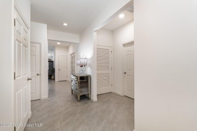 Like-New Golf Course Home in Mims! This nearly new single-story on Walkabout Golf and Country Club in Florida - for sale on GolfHomes.com, golf home, golf lot