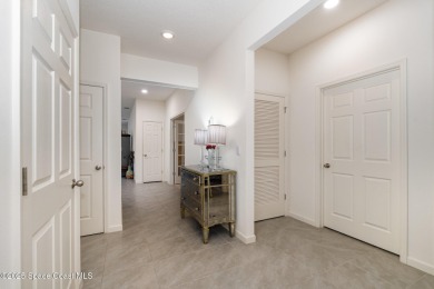 Like-New Golf Course Home in Mims! This nearly new single-story on Walkabout Golf and Country Club in Florida - for sale on GolfHomes.com, golf home, golf lot