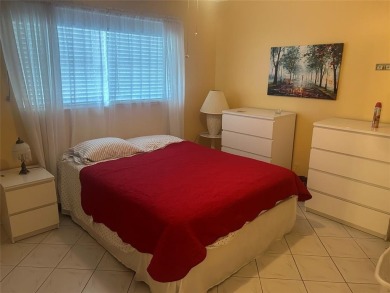 Welcome to this beautifully maintained 2-bedroom, 2-bathroom on Lauderhill Golf Course in Florida - for sale on GolfHomes.com, golf home, golf lot