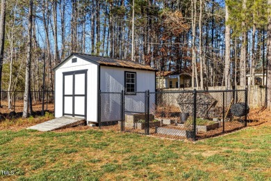 One of a kind ranch sitting on a double lot in a desirable gated on River Golf and County Club at Lake Royale in North Carolina - for sale on GolfHomes.com, golf home, golf lot