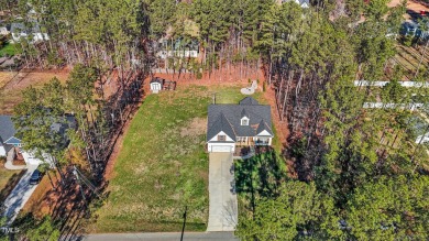 One of a kind ranch sitting on a double lot in a desirable gated on River Golf and County Club at Lake Royale in North Carolina - for sale on GolfHomes.com, golf home, golf lot