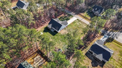 One of a kind ranch sitting on a double lot in a desirable gated on River Golf and County Club at Lake Royale in North Carolina - for sale on GolfHomes.com, golf home, golf lot