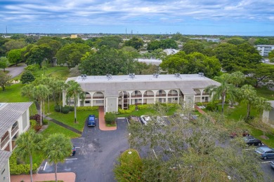 Welcome to your slice of paradise in the heart of Pompano Beach! on Wynmoor Golf Course in Florida - for sale on GolfHomes.com, golf home, golf lot