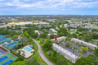 Welcome to your slice of paradise in the heart of Pompano Beach! on Wynmoor Golf Course in Florida - for sale on GolfHomes.com, golf home, golf lot