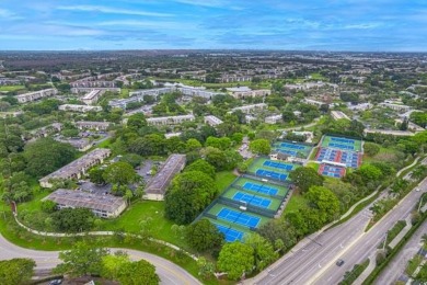 Welcome to your slice of paradise in the heart of Pompano Beach! on Wynmoor Golf Course in Florida - for sale on GolfHomes.com, golf home, golf lot