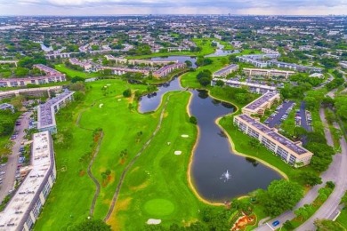 Welcome to your slice of paradise in the heart of Pompano Beach! on Wynmoor Golf Course in Florida - for sale on GolfHomes.com, golf home, golf lot