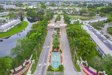 Welcome to your slice of paradise in the heart of Pompano Beach! on Wynmoor Golf Course in Florida - for sale on GolfHomes.com, golf home, golf lot