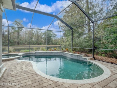 Welcome to this stunning single-level 4-bedroom, 3-bath POOL on Golf Club At North Hampton in Florida - for sale on GolfHomes.com, golf home, golf lot