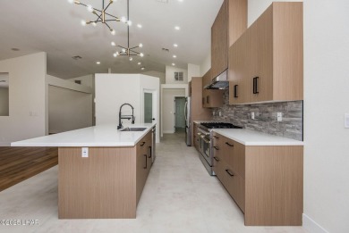 Prepare to be wowed by the freshly remodeled residence awaiting on Desert Lakes Golf Course in Arizona - for sale on GolfHomes.com, golf home, golf lot