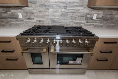 Prepare to be wowed by the freshly remodeled residence awaiting on Desert Lakes Golf Course in Arizona - for sale on GolfHomes.com, golf home, golf lot