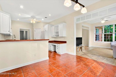 Experience refined living in this meticulously maintained on Ocean Ridge Plantation in North Carolina - for sale on GolfHomes.com, golf home, golf lot