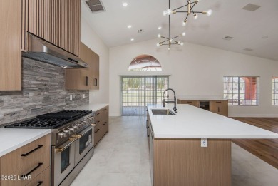 Prepare to be wowed by the freshly remodeled residence awaiting on Desert Lakes Golf Course in Arizona - for sale on GolfHomes.com, golf home, golf lot