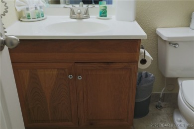 Looking for an affordable single family home in the coveted on The Oaks Golf Course in Missouri - for sale on GolfHomes.com, golf home, golf lot