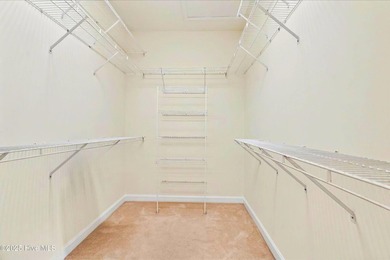 Experience refined living in this meticulously maintained on Ocean Ridge Plantation in North Carolina - for sale on GolfHomes.com, golf home, golf lot