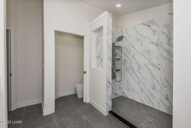Prepare to be wowed by the freshly remodeled residence awaiting on Desert Lakes Golf Course in Arizona - for sale on GolfHomes.com, golf home, golf lot