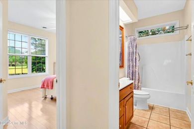 Experience refined living in this meticulously maintained on Ocean Ridge Plantation in North Carolina - for sale on GolfHomes.com, golf home, golf lot