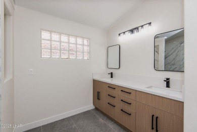Prepare to be wowed by the freshly remodeled residence awaiting on Desert Lakes Golf Course in Arizona - for sale on GolfHomes.com, golf home, golf lot