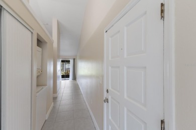 Welcome to this charming 1-bedroom, 1-bath end unit condo on Capri Isle Golf Club in Florida - for sale on GolfHomes.com, golf home, golf lot
