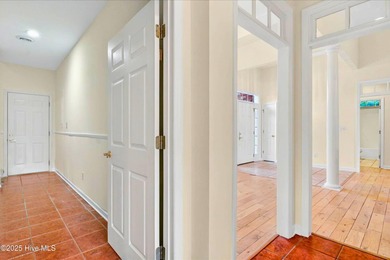 Experience refined living in this meticulously maintained on Ocean Ridge Plantation in North Carolina - for sale on GolfHomes.com, golf home, golf lot