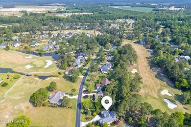 Experience refined living in this meticulously maintained on Ocean Ridge Plantation in North Carolina - for sale on GolfHomes.com, golf home, golf lot