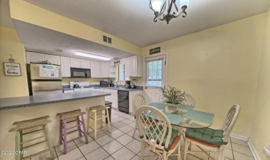 2BR/2.5BA END UNIT townhome with private back patio in a gated on Edgewater Beach Resort in Florida - for sale on GolfHomes.com, golf home, golf lot