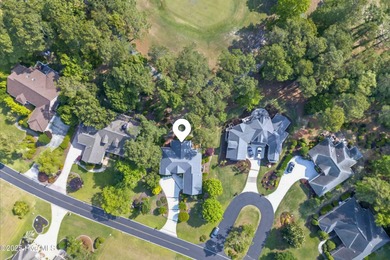 Experience refined living in this meticulously maintained on Ocean Ridge Plantation in North Carolina - for sale on GolfHomes.com, golf home, golf lot