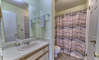 2BR/2.5BA END UNIT townhome with private back patio in a gated on Edgewater Beach Resort in Florida - for sale on GolfHomes.com, golf home, golf lot