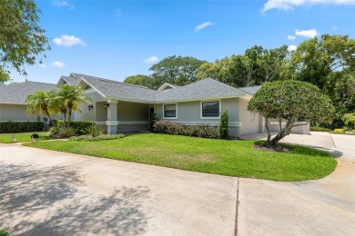 COUNTRY CLUB living at it's finest! This three bedroom villa in on Cypress Run Golf Club - Pinellas in Florida - for sale on GolfHomes.com, golf home, golf lot