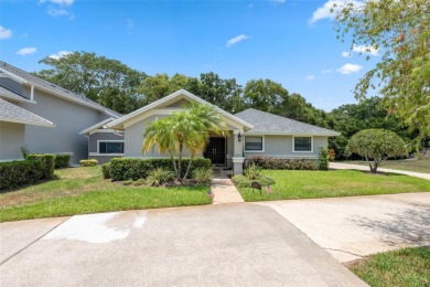 COUNTRY CLUB living at it's finest! This three bedroom villa in on Cypress Run Golf Club - Pinellas in Florida - for sale on GolfHomes.com, golf home, golf lot