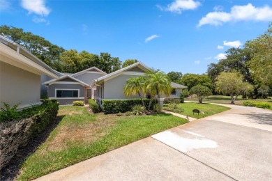 COUNTRY CLUB living at it's finest! This three bedroom villa in on Cypress Run Golf Club - Pinellas in Florida - for sale on GolfHomes.com, golf home, golf lot