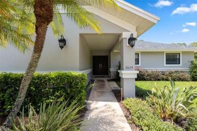 COUNTRY CLUB living at it's finest! This three bedroom villa in on Cypress Run Golf Club - Pinellas in Florida - for sale on GolfHomes.com, golf home, golf lot