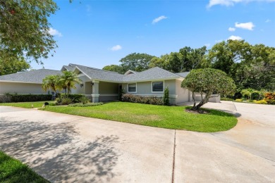 COUNTRY CLUB living at it's finest! This three bedroom villa in on Cypress Run Golf Club - Pinellas in Florida - for sale on GolfHomes.com, golf home, golf lot