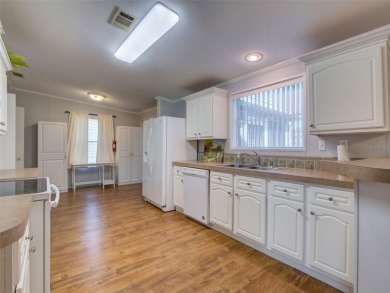 Come and see this turn key ready 3/2 by Palm Harbor home (Vegas on Zellwood Station Country Club in Florida - for sale on GolfHomes.com, golf home, golf lot