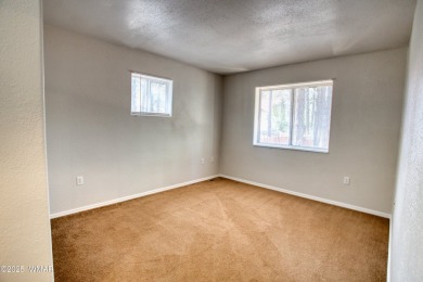 This very nice three bed two bath home has a great fenced back on Bison Golf and Country Club in Arizona - for sale on GolfHomes.com, golf home, golf lot