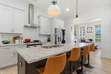 Experience the elegance of this stunning Craftsman-style on Milledgeville Country Club in Georgia - for sale on GolfHomes.com, golf home, golf lot