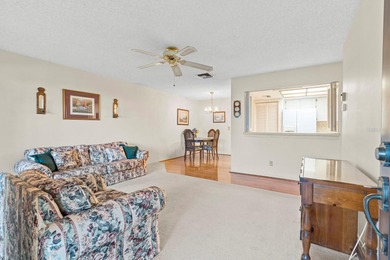 Welcome to effortless Florida living in this furnished on Highland Lakes Executive Golf Course in Florida - for sale on GolfHomes.com, golf home, golf lot