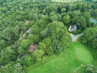 Incredible view potential from this high elevation lot nestled on Wolf Laurel Country Club in North Carolina - for sale on GolfHomes.com, golf home, golf lot