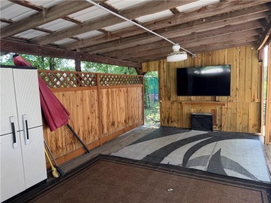 Welcome to your private retreat in the gated lake community of on Linn Valley Lakes - Deer Trace Golf Course in Kansas - for sale on GolfHomes.com, golf home, golf lot