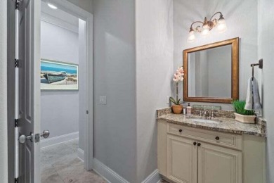 Discover the exquisite Mediterranean-style residence in the on Sandestin Golf and Beach Resort - Raven in Florida - for sale on GolfHomes.com, golf home, golf lot