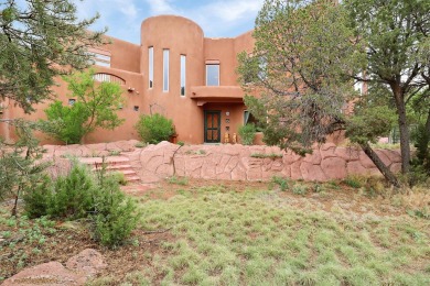 This custom Leo Husky home is a beautiful combination of nature on Paa-Ko Ridge Golf Club  in New Mexico - for sale on GolfHomes.com, golf home, golf lot